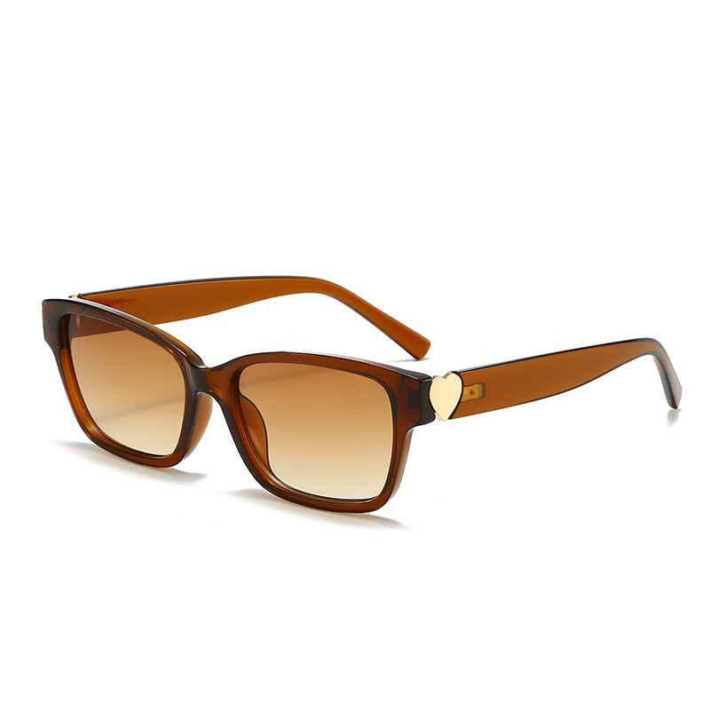 Damen modische quadratische Sonnenbrille mit Herz-Akzenten Karnz
