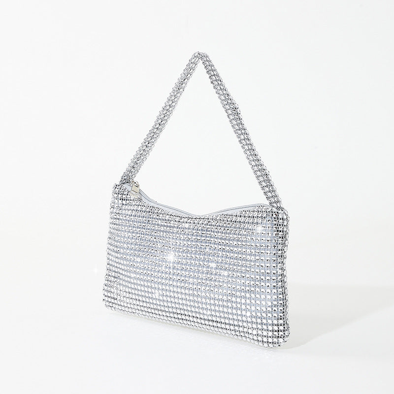 Elegante, mit Strass verzierte Handtasche