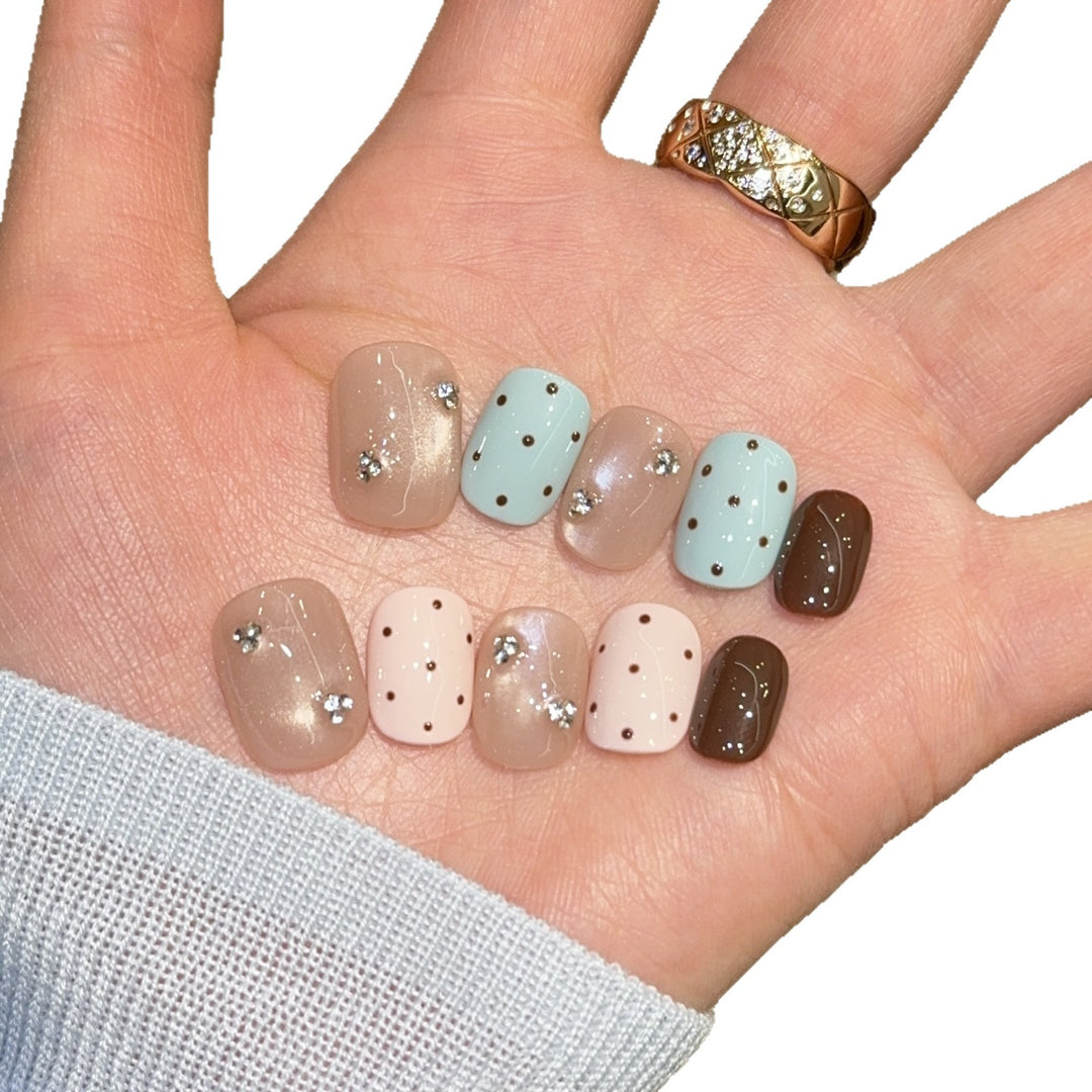 Kunstnägel mit Strass und Glitzer Karnz