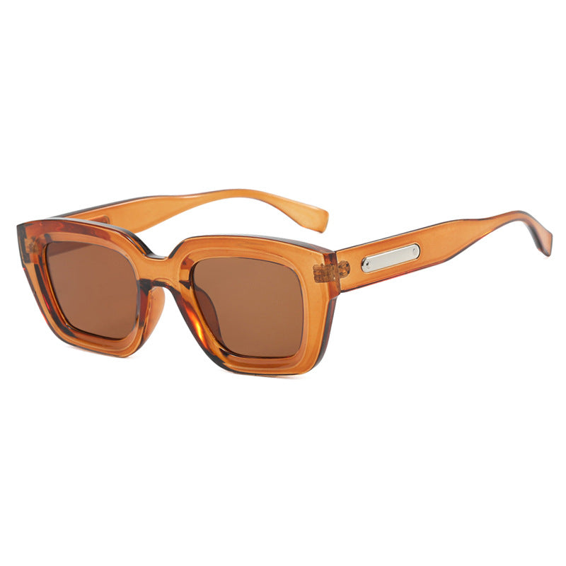 Damen quadratische Sonnenbrille mit transparentem Rahmen und braunen Gläsern Karnz