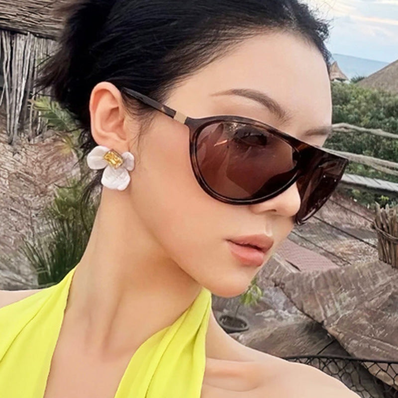 Damen Cat-Eye Sonnenbrille mit einzigartigem Design und schützendem UV-Filter Karnz