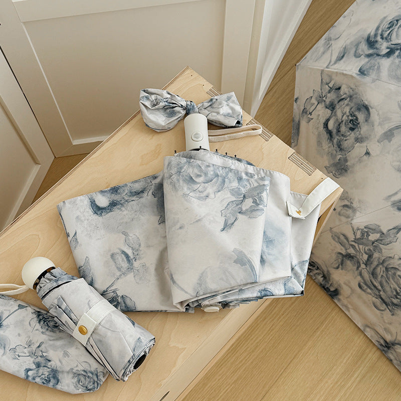 Damen Faltbarer Regenschirm mit romantischem Blumendesign Karnz