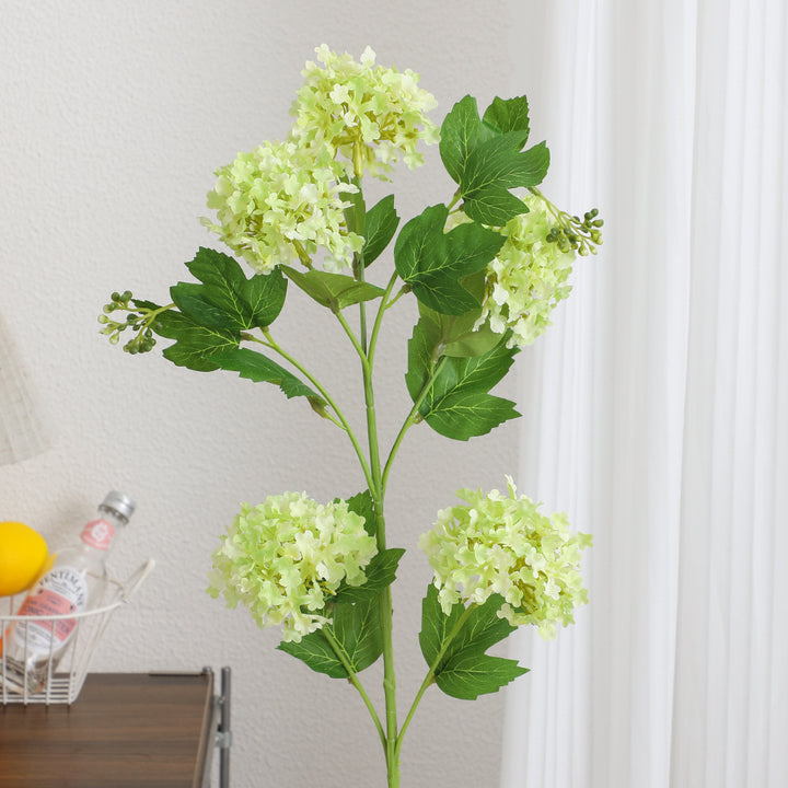 Künstlicher Hydrangeazweig mit lebhaften Blüten und detailreichen Blättern Karnz