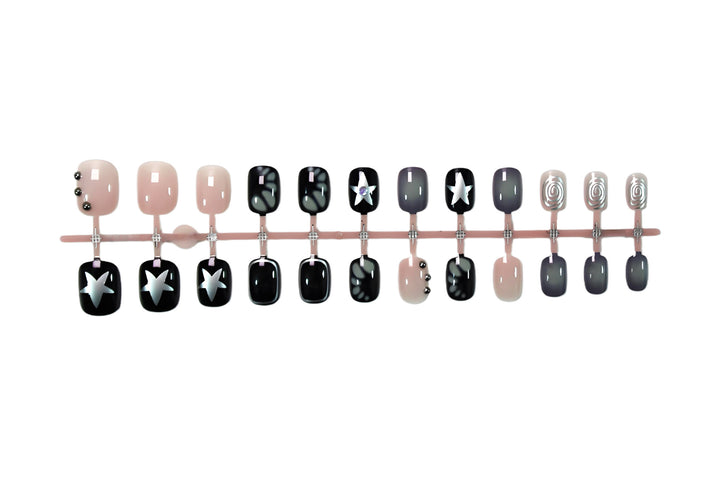 Kunstnagelset mit kreativen Sternen- und Glitzerdesigns Karnz