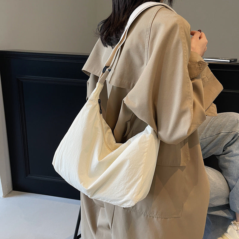 Sling Schultertasche