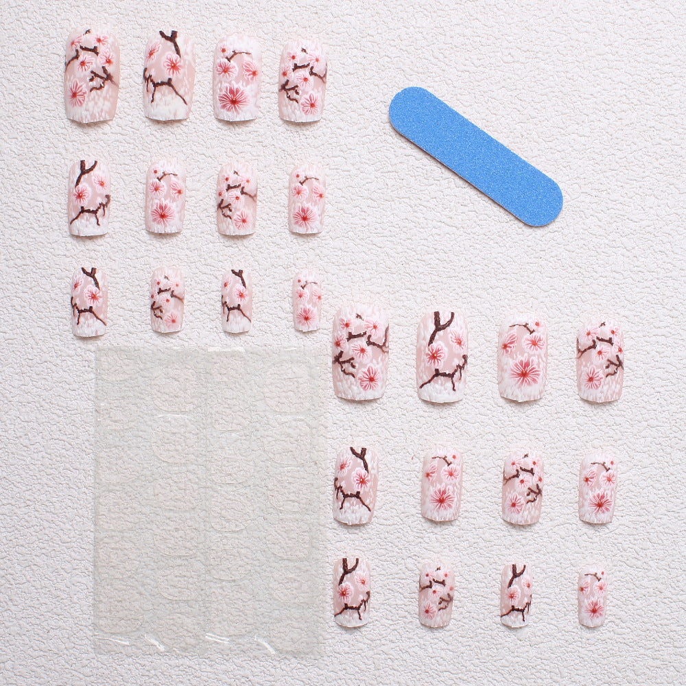 Blumenverzierte Press-On Nagelkunst Karnz