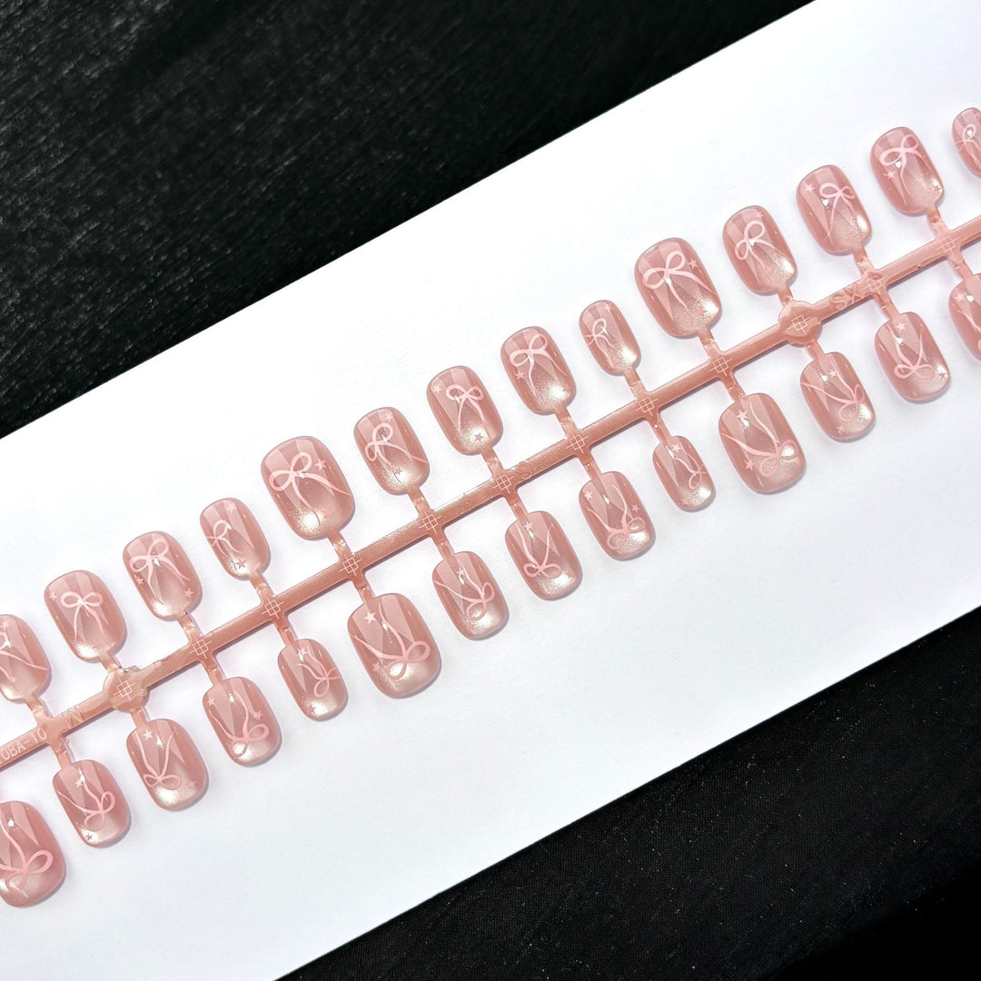 Press-On Nail Art Set mit dekorativem Schleifendesign