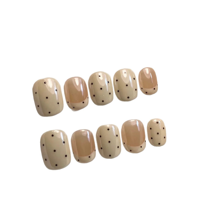 Dekorativer Press-On-Nagelset mit Punktdesign
