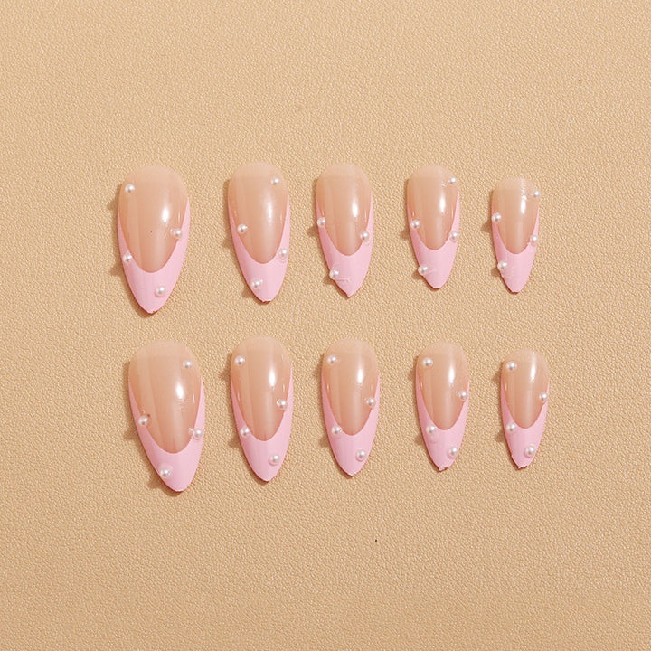 Kunstnagelset mit glamourösen 3D-Verzierungen und elegantem Desig Karnz