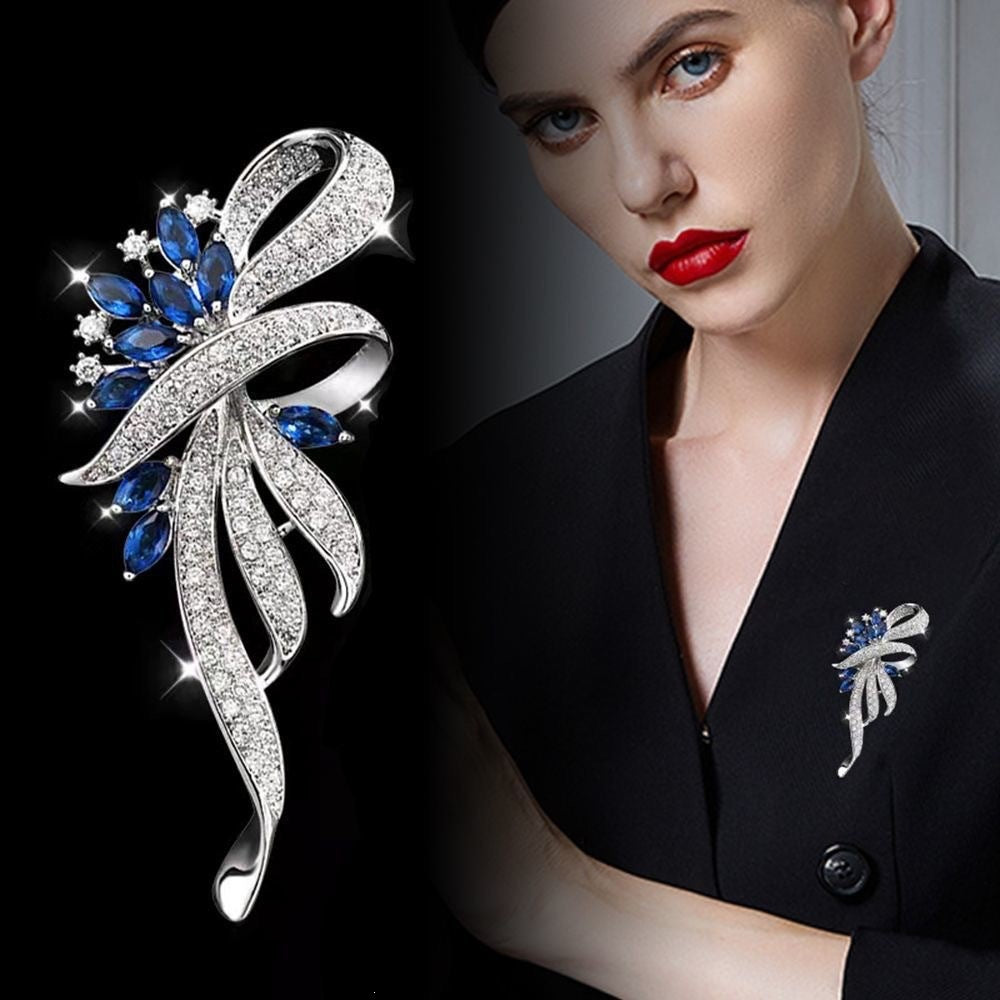 Exquisite Brosche mit Funkelnden Zirkonia und Blauen Edelsteinen Karnz