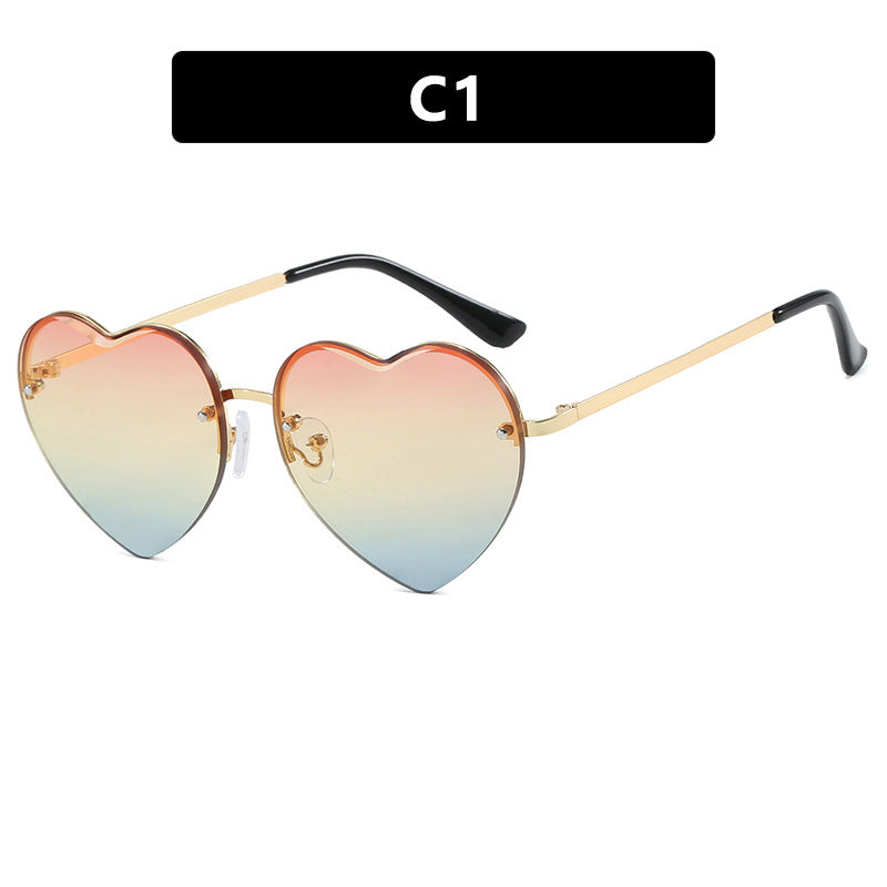 Damen Herzförmige Sonnenbrille mit verspiegelten Gläsern und modischem Metallrahmen Karnz