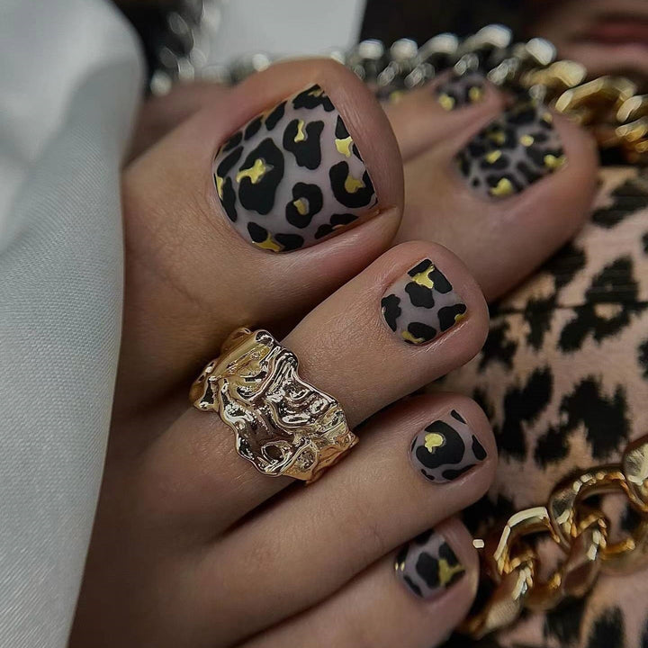 Künstlerischer Leopardenprint Zehen Nagelkunst Karnz