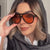 Damen stilvolle Sonnenbrille mit markantem Design Karnz