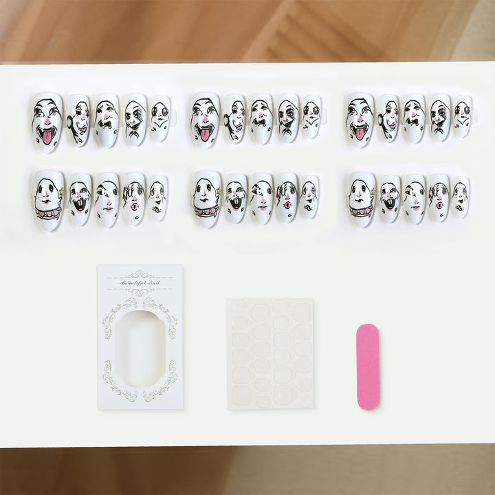 Kreatives Kunstnagelset mit Gesichtsmotiven Karnz