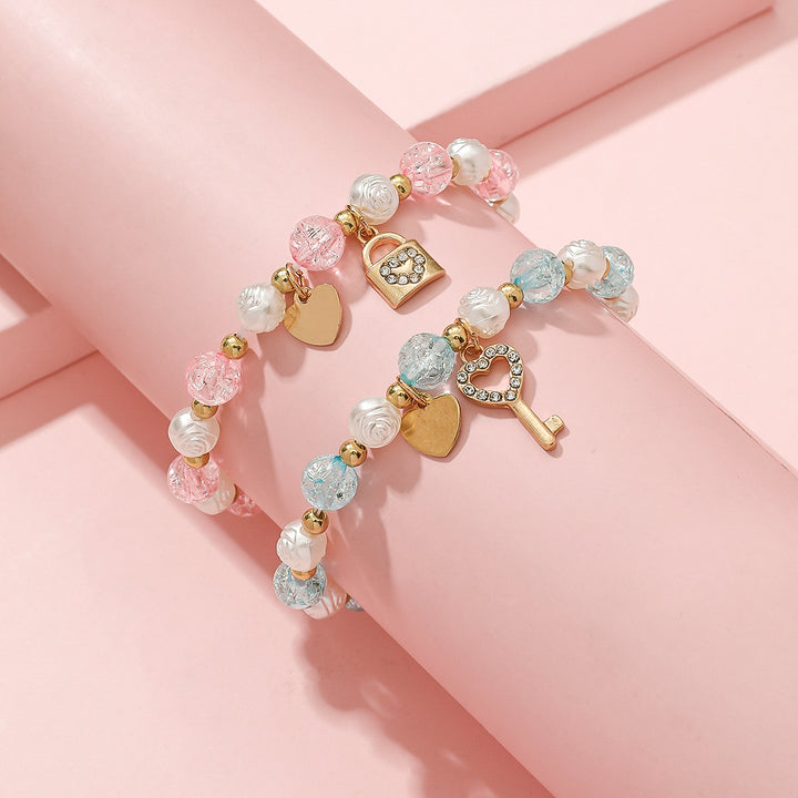 Verspieltes Armbandset mit Herz- und Schlüsseldesign Karnz
