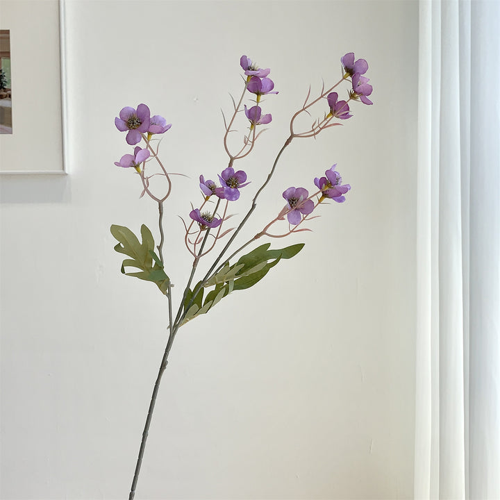 Dekorativer künstlicher Blumenzweig