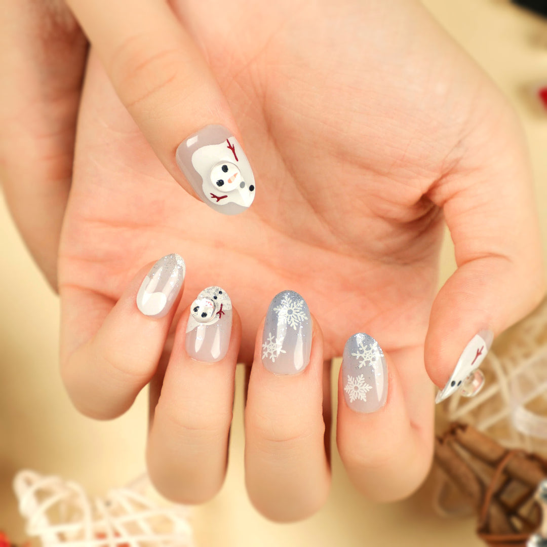 Kunstvolle Winter-Nagelverlängerungen mit Schneemann-Design Karnz