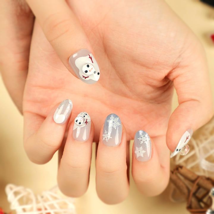 Kunstvolle Winter-Nagelverlängerungen mit Schneemann-Design Karnz