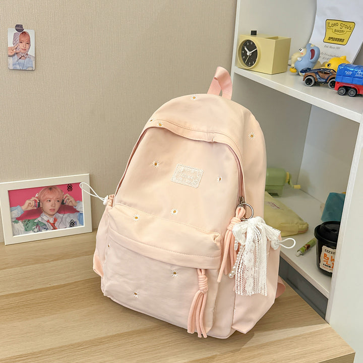 Stylischer backpack mit floralem Schmuck Karnz