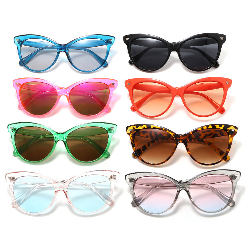 Damen modische Cat-Eye Sonnenbrille mit transparentem Rahmen und blauen Gläsern Karnz