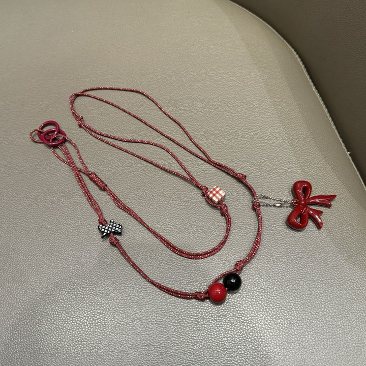 Verspielter Perlen Charm Brillenhalter Karnz