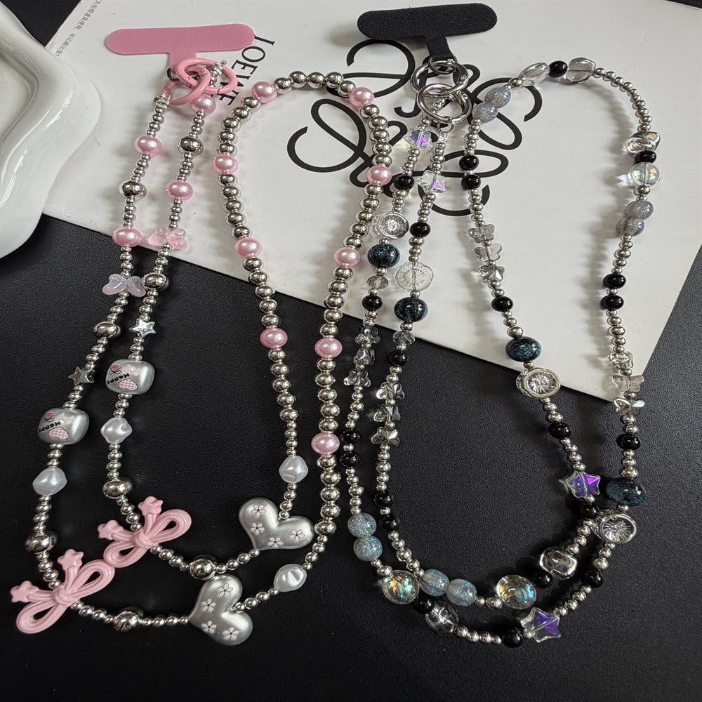 Mehrsträngige Perlenkette mit Charms Karnz