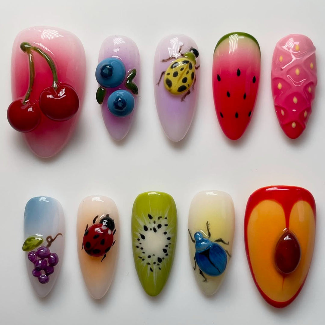 Kreative Obst- und Insekten-Themen Presse-auf-Nagelkunst Karnz