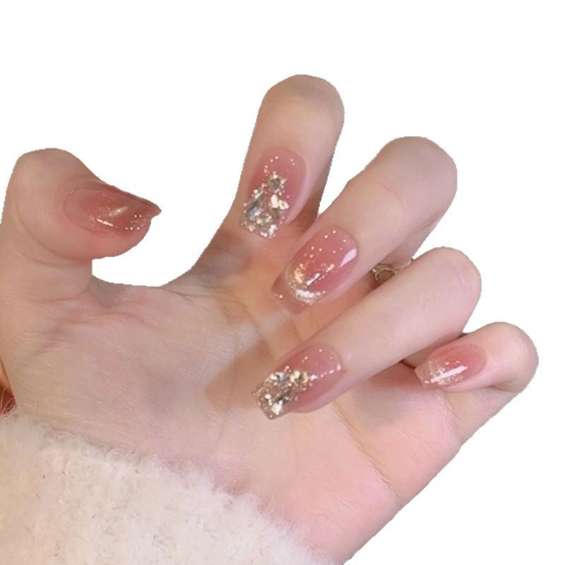Elegante dekorative Press-On Nägel mit Glitzerakzenten