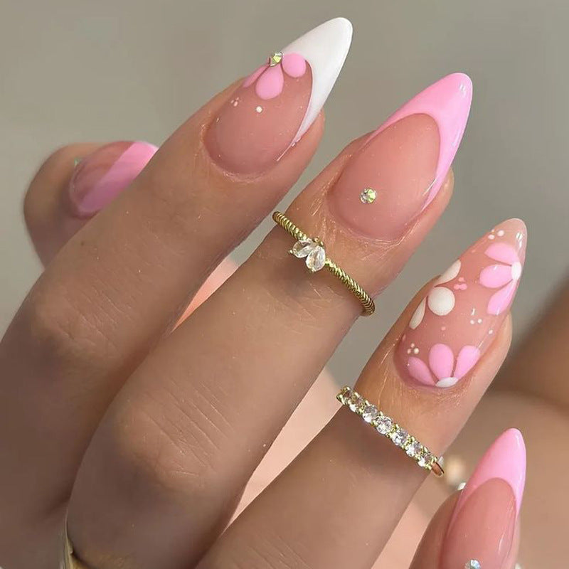 Künstlerische florale Nagelspitzen