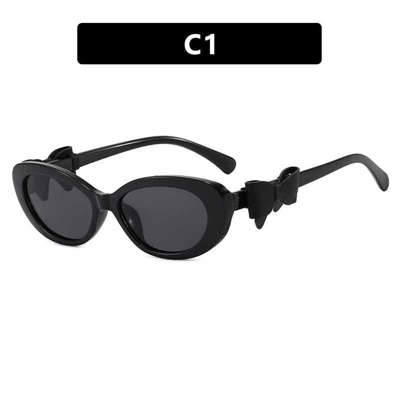 Damen modische Sonnenbrille mit verspieltem Schleifen-Design Karnz