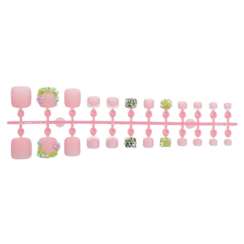Kreatives Nagelset mit Glitzer- und Blumendesigns Karnz