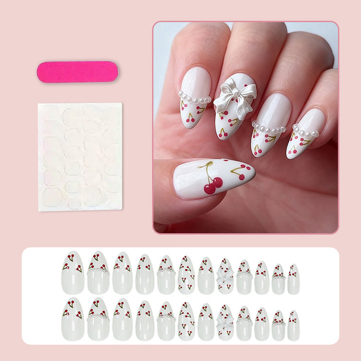 Kunstnagelset mit floralen Cherrymotiven und eleganten Schleifen Karnz