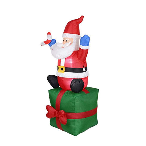 Aufblasbare Weihnachtsmann-Dekorationsfigur auf Geschenkpaket