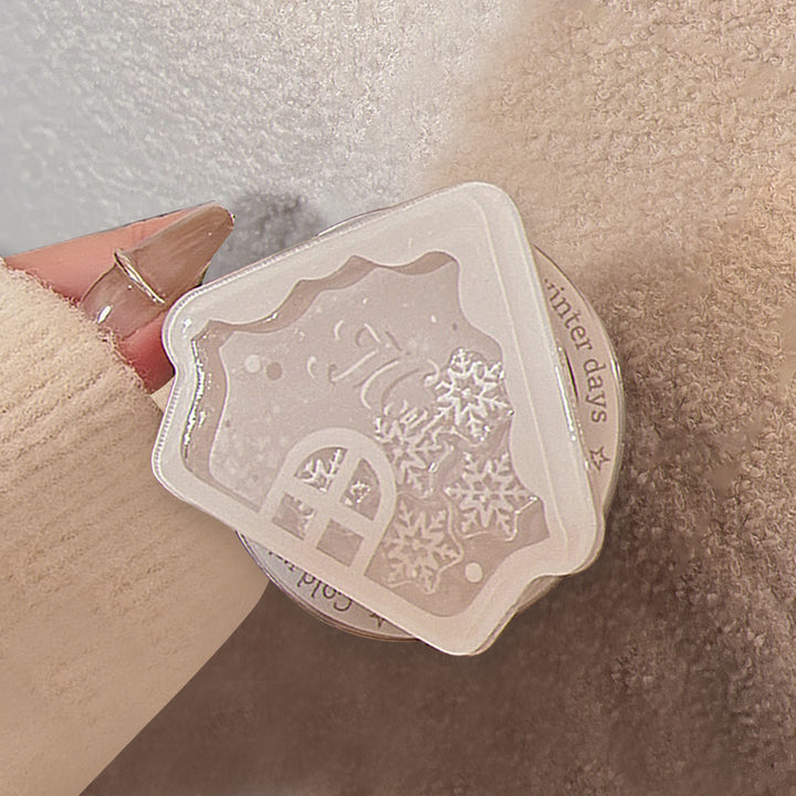 Duftkerze im Winterhaus-Design Karnz