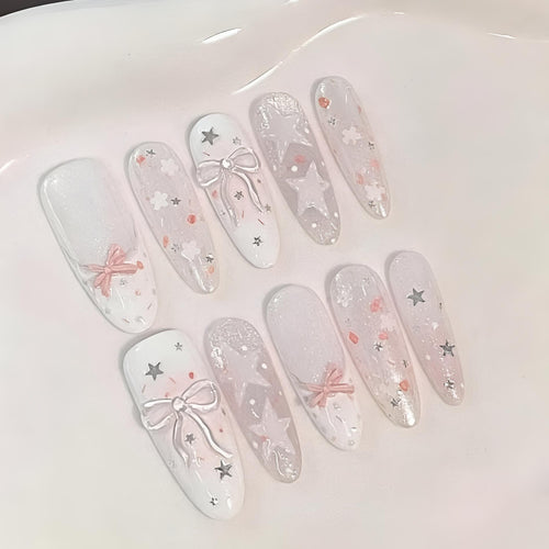 Dekorative Press-On Nagelkunst Set mit Sternen und Schleifen