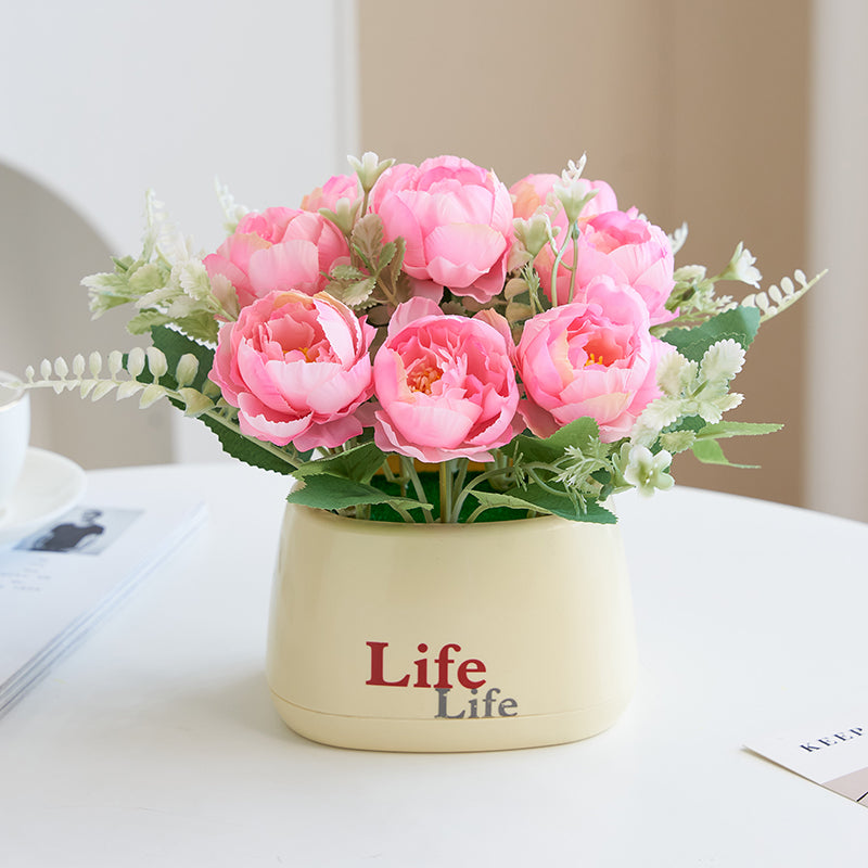 Lebensechte Dekorative Blumenanordnung