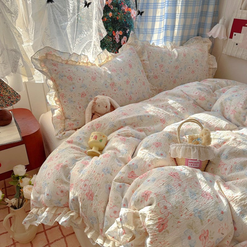 Blumenverziertes Steppbett-Set