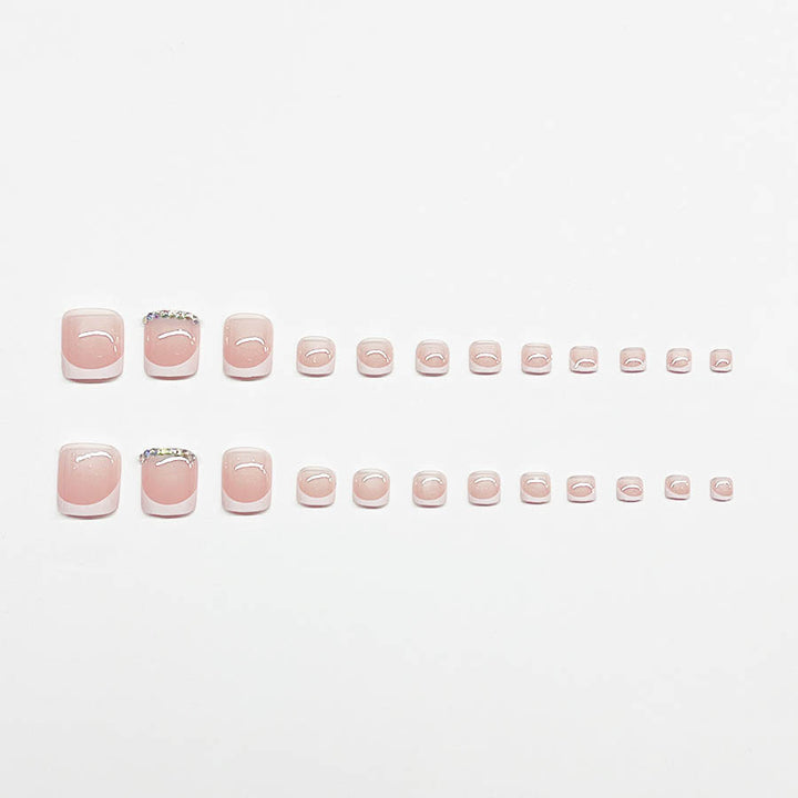 Fußnagelkunstset mit elegantem französischen Design und funkelnden Akzenten Karnz