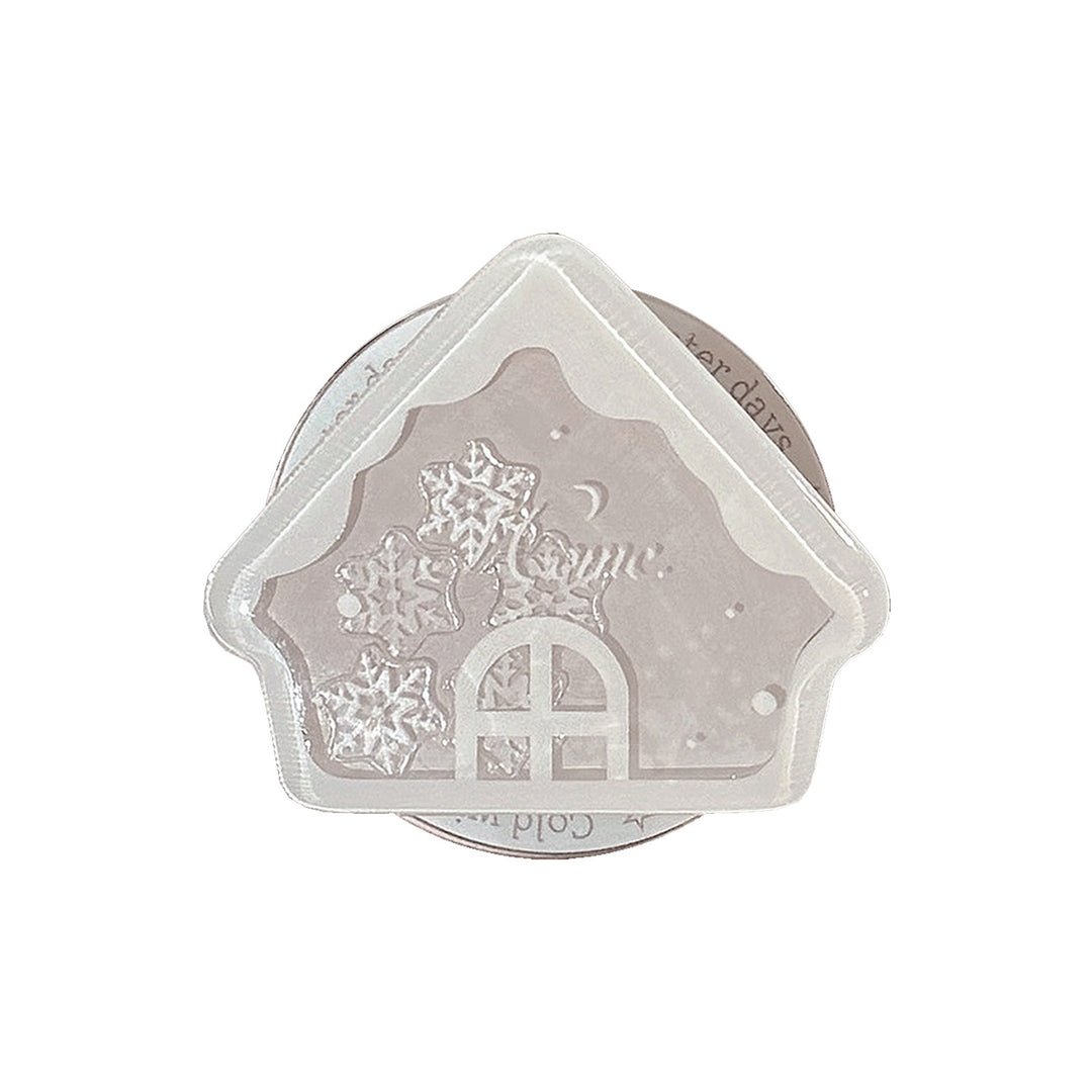 Duftkerze im Winterhaus-Design Karnz