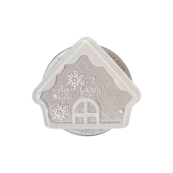 Duftkerze im Winterhaus-Design Karnz