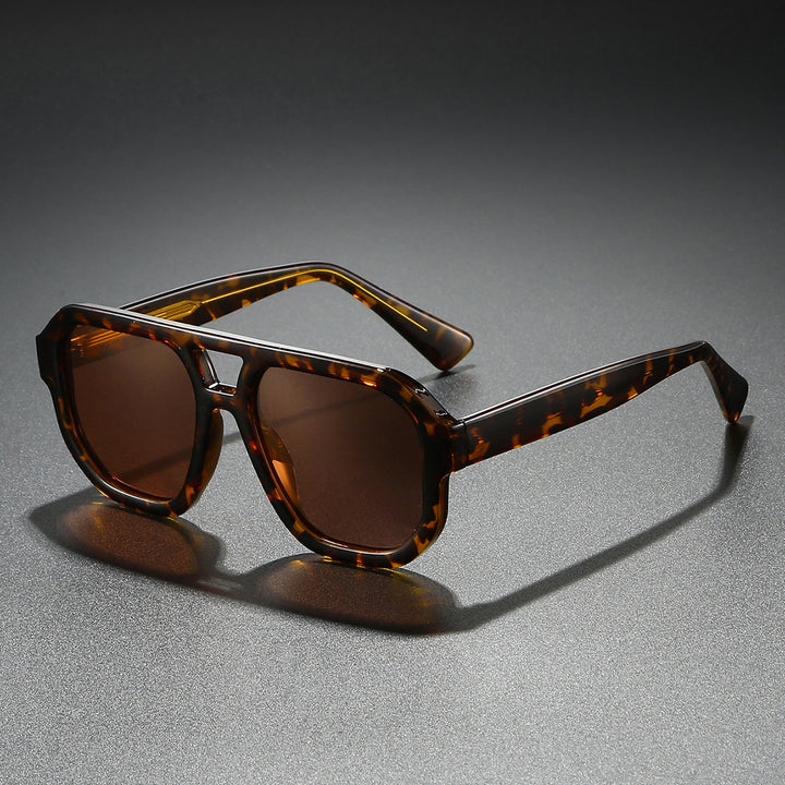 Damen Sonnenbrille im modernen urbanen Design mit breitem Rand Karnz