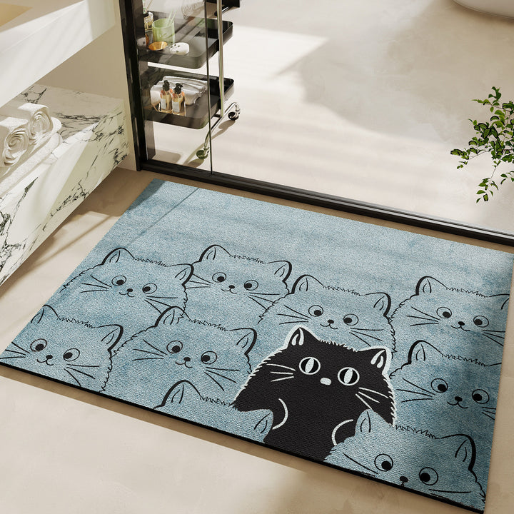 Niedlicher katzenmotivierter Badteppich
