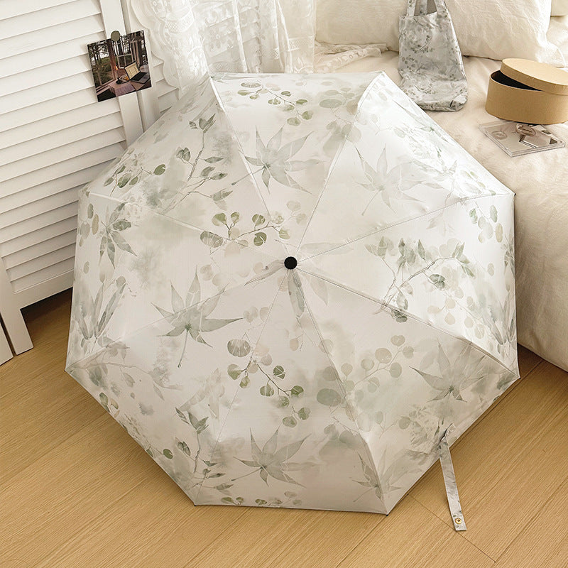 Damen Faltbarer Regenschirm mit elegantem botanischem Muster Karnz