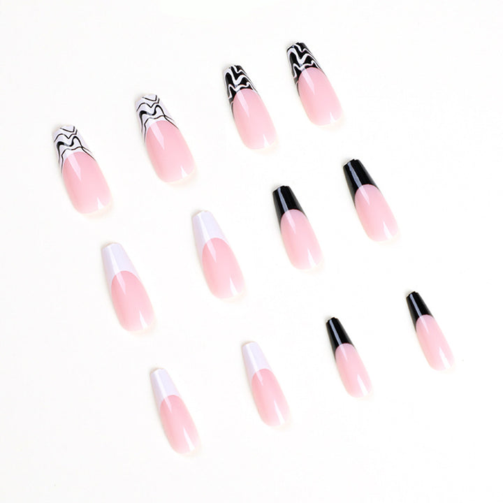 Kunstvolle Nagelverlängerungen mit modernem Monochrom-Design Karnz