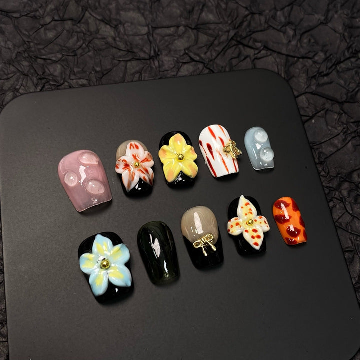 Künstlerische Blumendruck-Press-On-Nagelkollektion