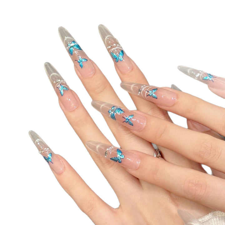 Künstlerisches Press-On-Nagelset mit Schmetterlingsakzenten