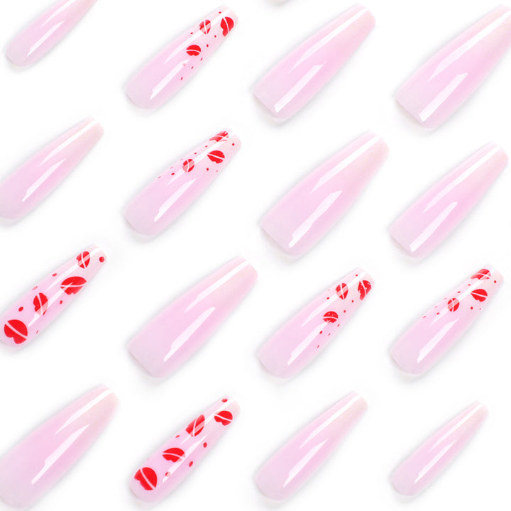 Kunstvolle Stiletto-Nägel mit Lippenmotiven Karnz