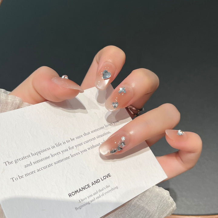 Herzförmige Kristall-verzierte Press-On Nagelkunst Karnz