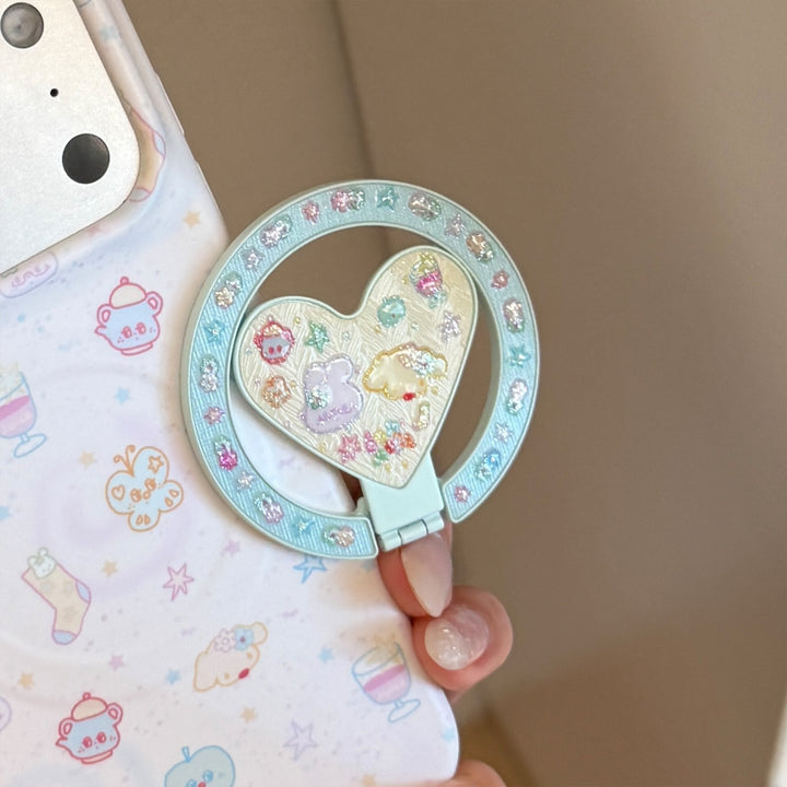 Herzförmiger Smartphone Fingerhalter Karnz