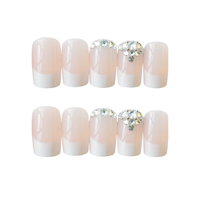 Elegante French Tip Press-On Nagelset mit Rhinstein-Akzenten